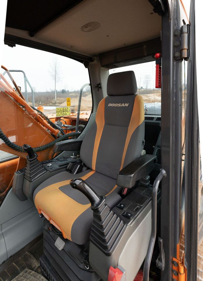 Doosan DX225LC Crawler Excavator interior cab view Doosan DX225LC Crawler Excavator interior cab view