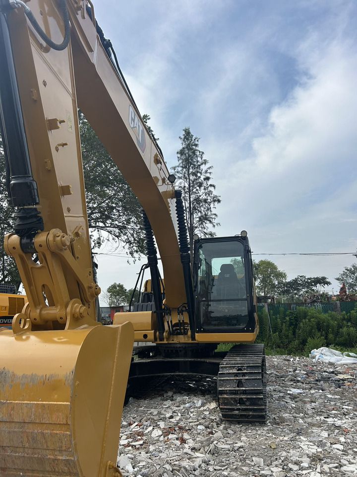 2020 Caterpillar 320GC crawler excavator front three-quarter view