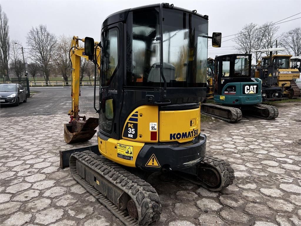 2011 Komatsu PC35MR-3 mini excavator, rear three-quarter view