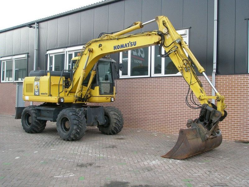 2008 Komatsu PW140-7 wheel excavator side view 2008 Komatsu PW140-7 wheel excavator side view