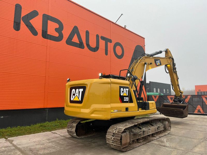 2019 Caterpillar 320 crawler excavator, rear three-quarter view