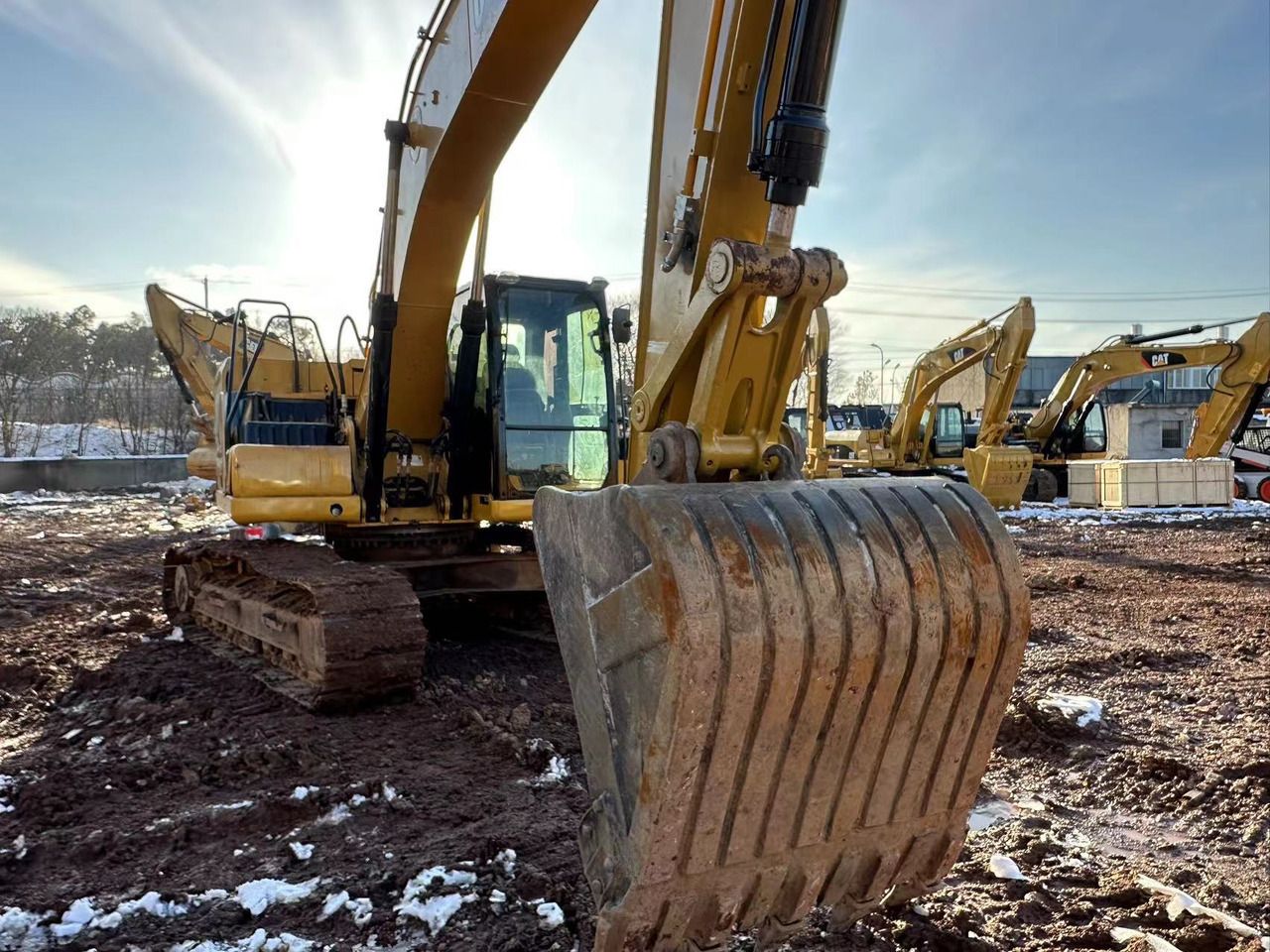 2021 Caterpillar 320GC crawler excavator, front view with bucket