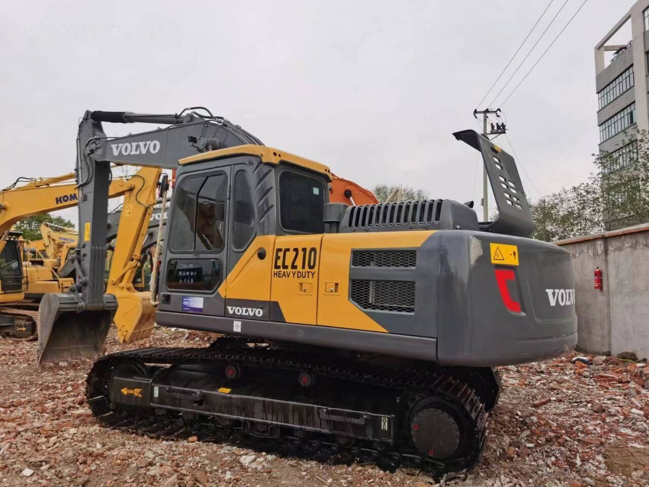 2019 Volvo EC210 crawler excavator, rear three-quarter view
