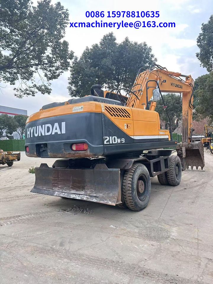 2023 Hyundai R210W-9 wheel excavator rear three-quarter view 2023 Hyundai R210W-9 wheel excavator rear three-quarter view