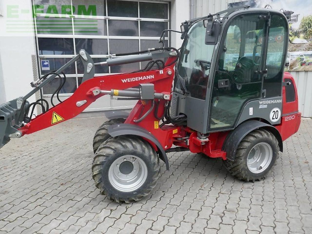 2022 Weidemann 1280 mini excavator, side view 2022 Weidemann 1280 mini excavator, side view