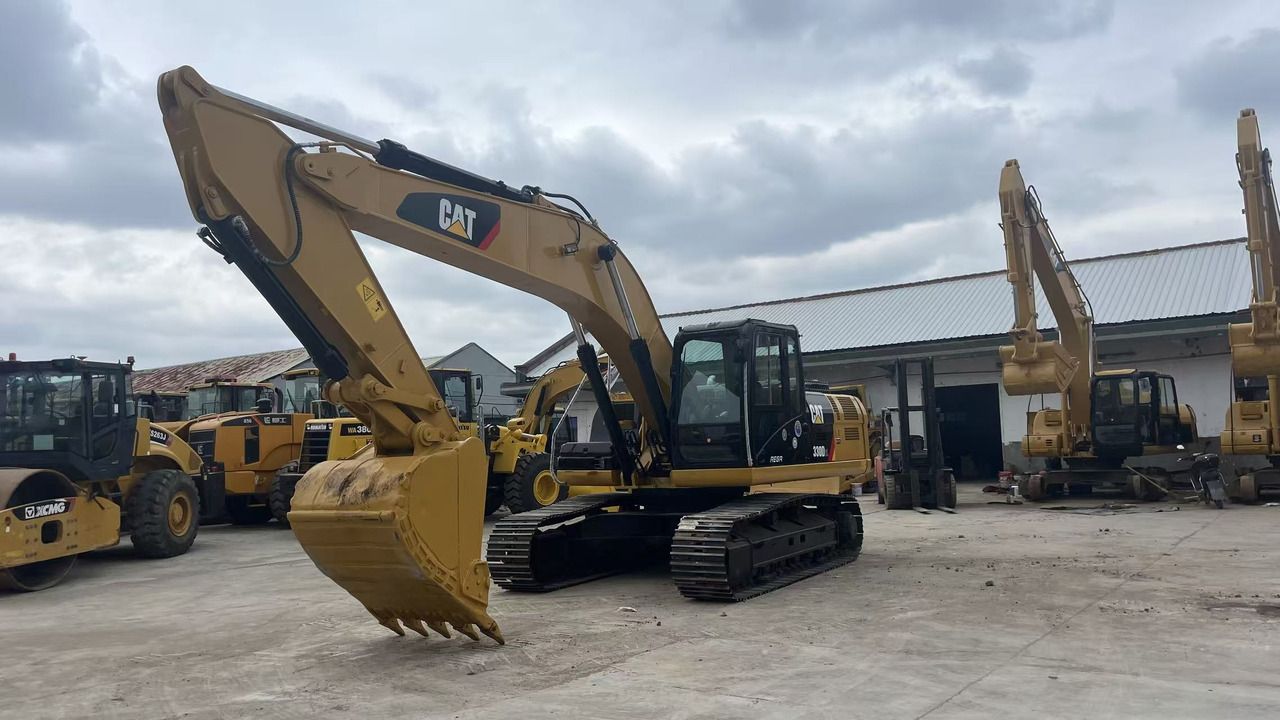 2023 Caterpillar 330D2L crawler excavator, front three-quarter view