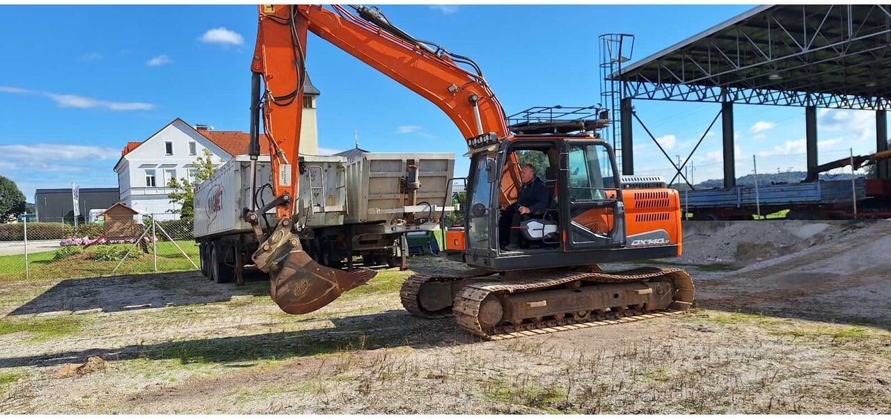 Doosan DX140LC-5 crawler excavator, side view