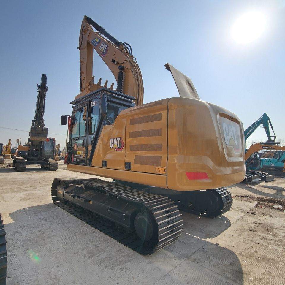 2024 Caterpillar 323GC crawler excavator, rear three-quarter view 2024 Caterpillar 323GC crawler excavator, rear three-quarter view