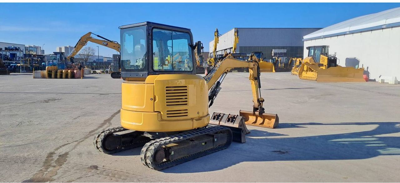 2021 Caterpillar 303.5E crawler excavator, rear three-quarter view 2021 Caterpillar 303.5E crawler excavator, rear three-quarter view