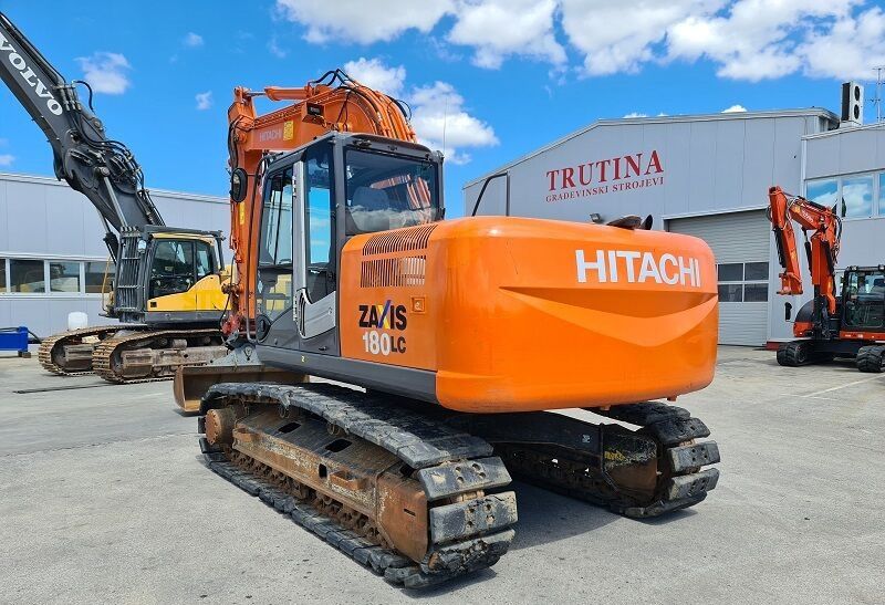 2012 Hitachi ZX180LC-3 crawler excavator, rear three-quarter view 2012 Hitachi ZX180LC-3 crawler excavator, rear three-quarter view