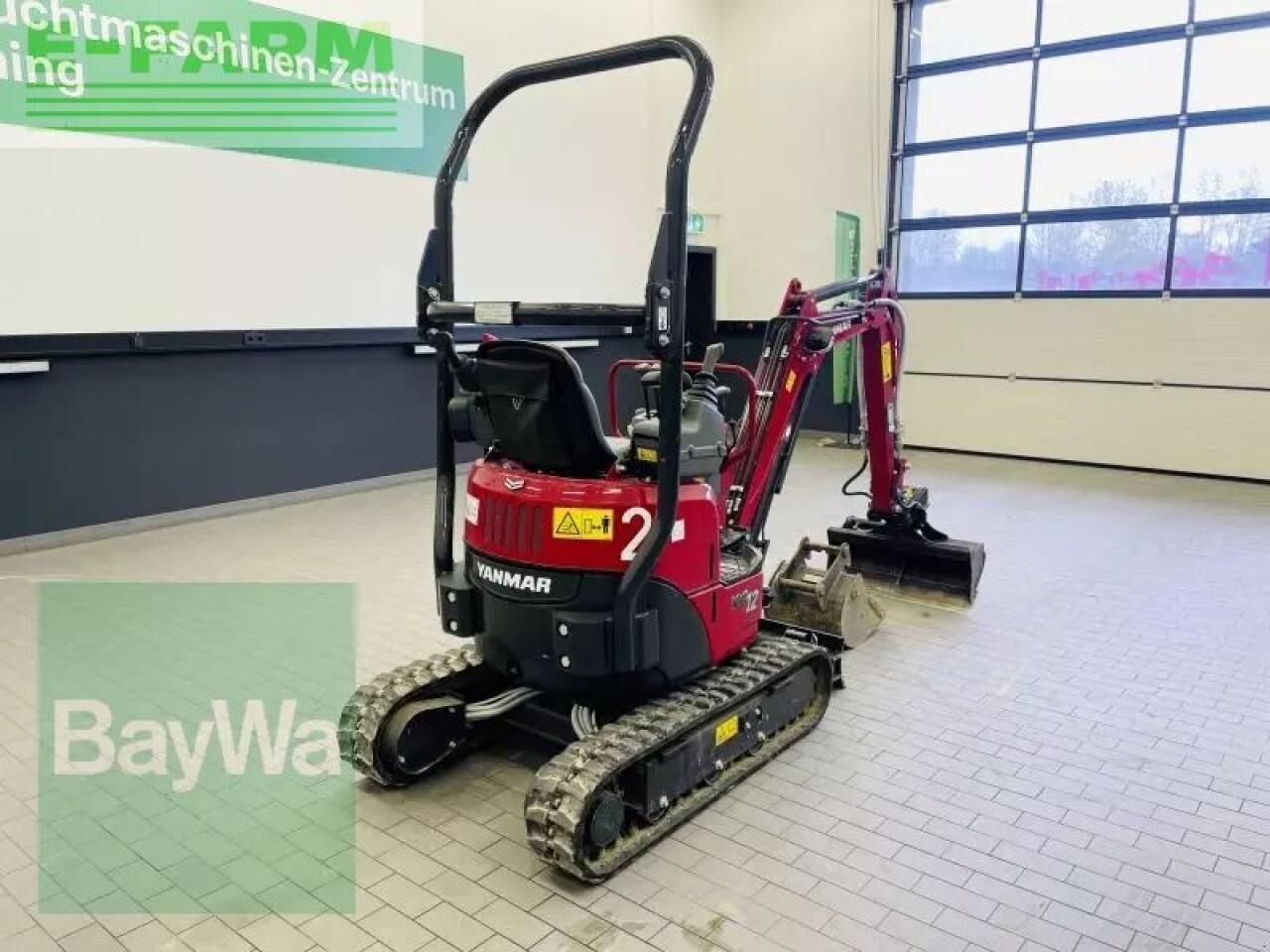 2025 Yanmar VIO12-2A mini excavator, rear three-quarter view 2025 Yanmar VIO12-2A mini excavator, rear three-quarter view