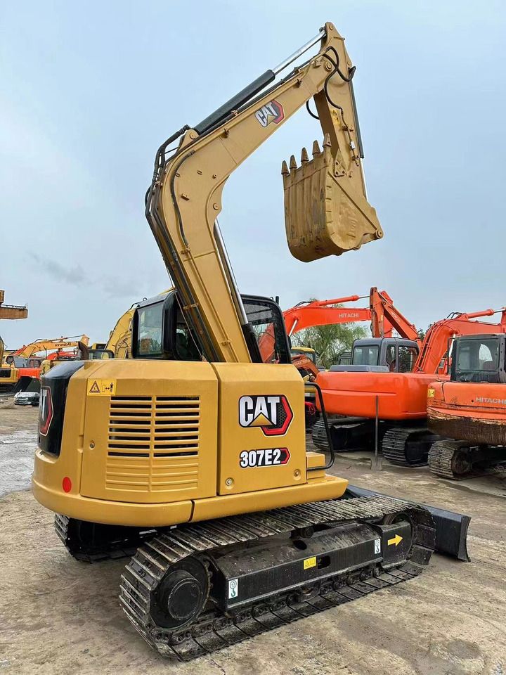 2024 Caterpillar 307E2 mini excavator, rear three-quarter view 2024 Caterpillar 307E2 mini excavator, rear three-quarter view
