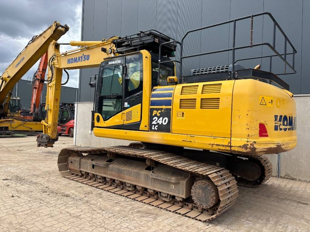 2019 Komatsu PC240LC-11 crawler excavator, rear three-quarter view 2019 Komatsu PC240LC-11 crawler excavator, rear three-quarter view