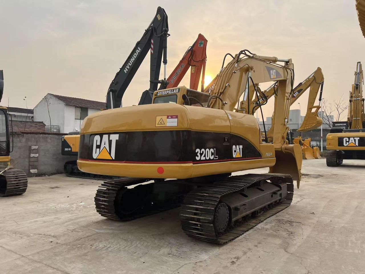 Caterpillar 320CL Raupenbagger von 2013, Ansicht hinten dreiviertel