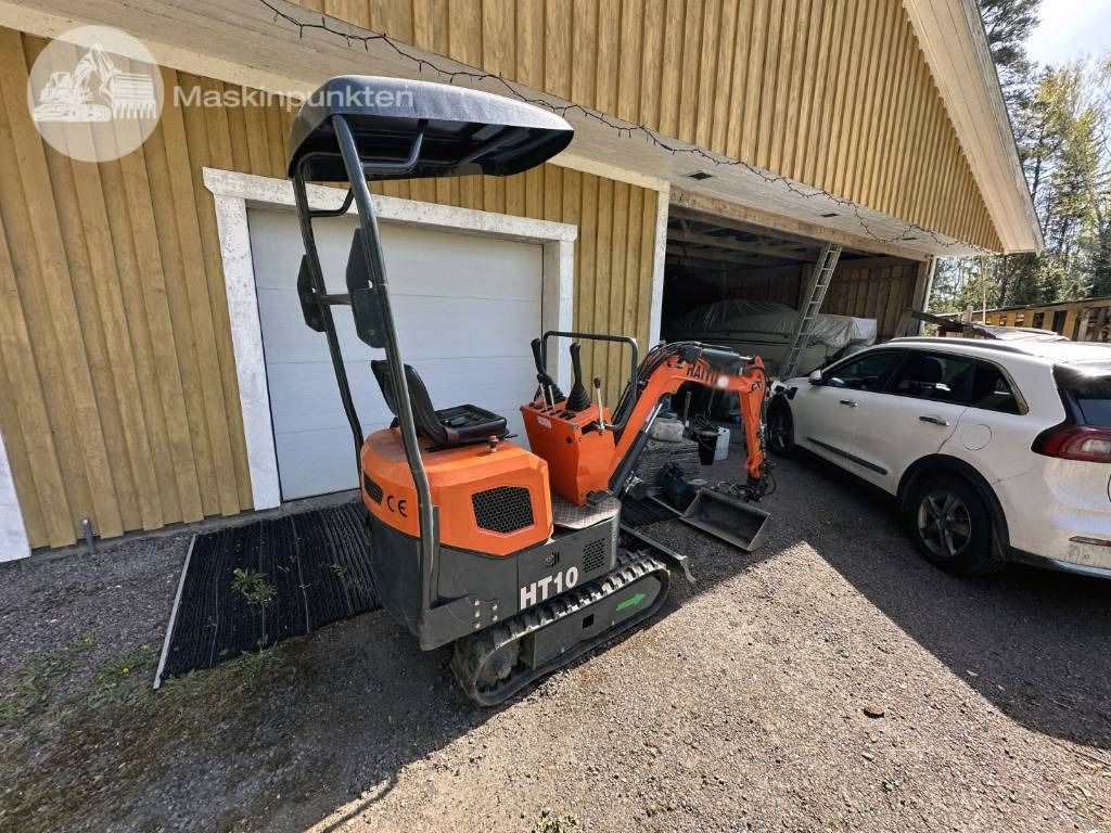 2022 Haitui HT10 mini excavator, rear three-quarter view 2022 Haitui HT10 mini excavator, rear three-quarter view