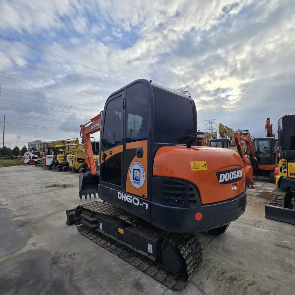 2020 Doosan DH60-7 mini excavator, rear three-quarter view 2020 Doosan DH60-7 mini excavator, rear three-quarter view