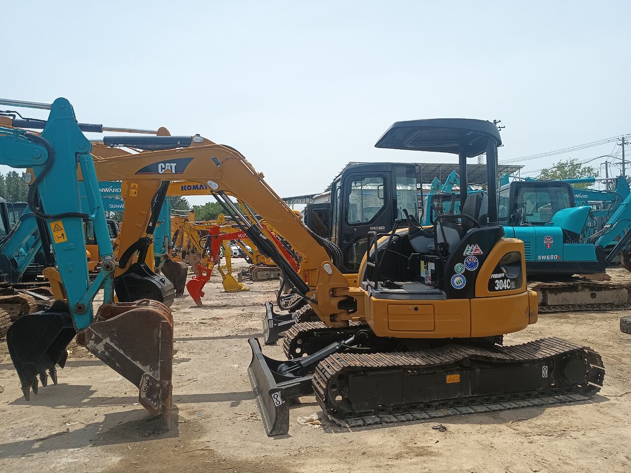 2024 Caterpillar 304CR mini excavator, side view