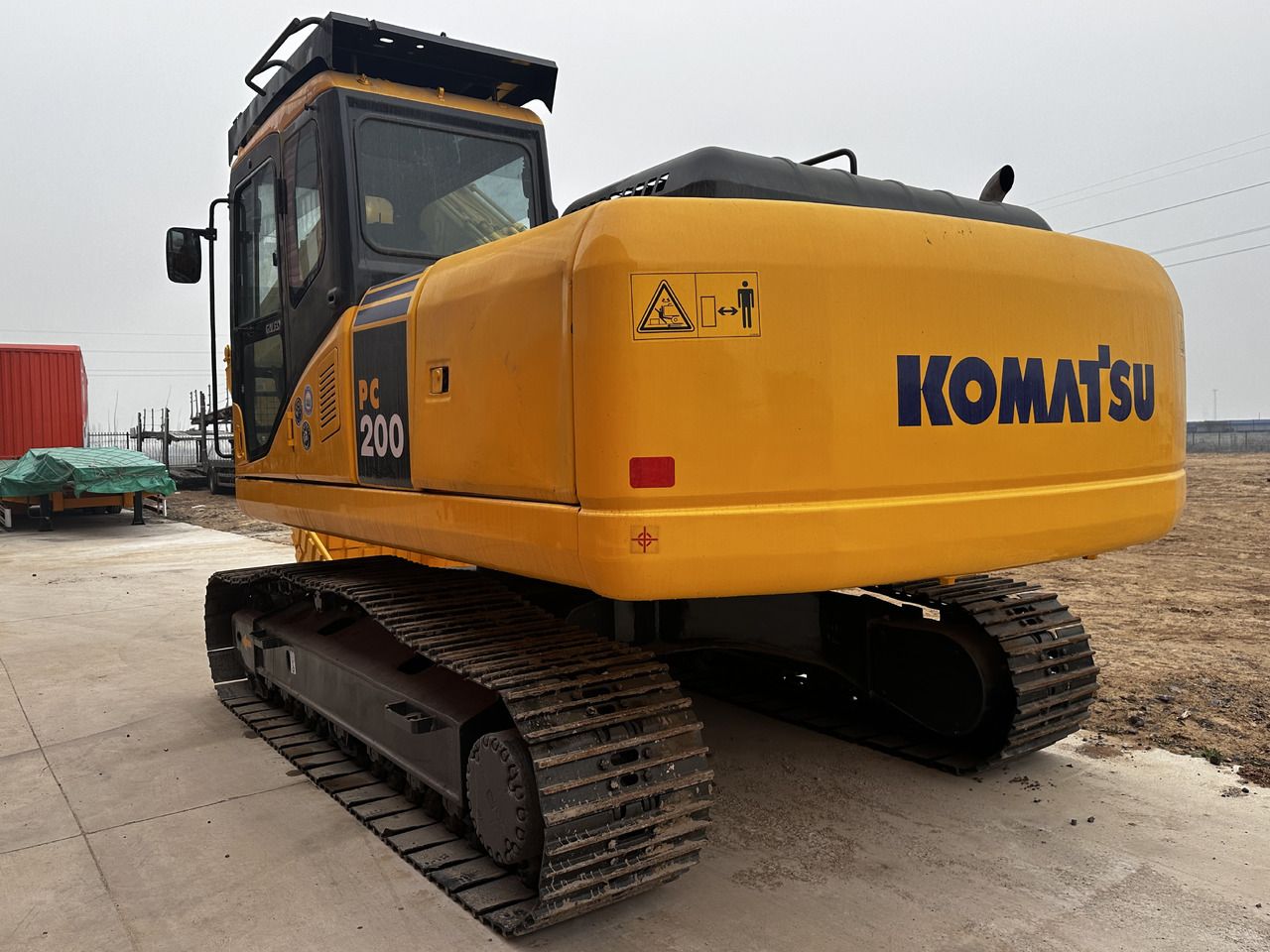 2022 Komatsu PC200 crawler excavator, rear three-quarter view