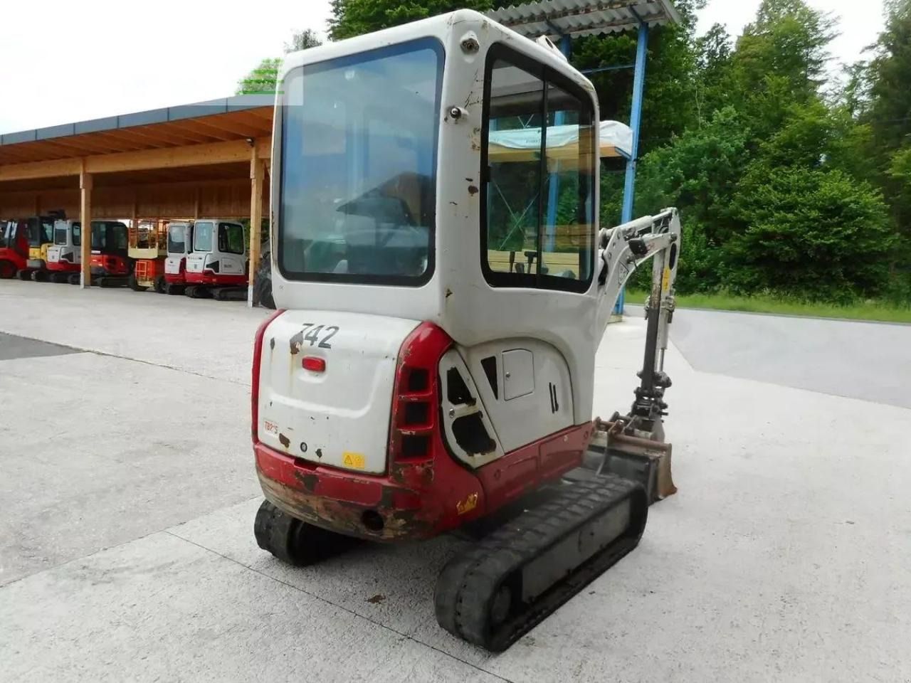 2015 Takeuchi TB216 mini excavator, rear three-quarter view 2015 Takeuchi TB216 mini excavator, rear three-quarter view