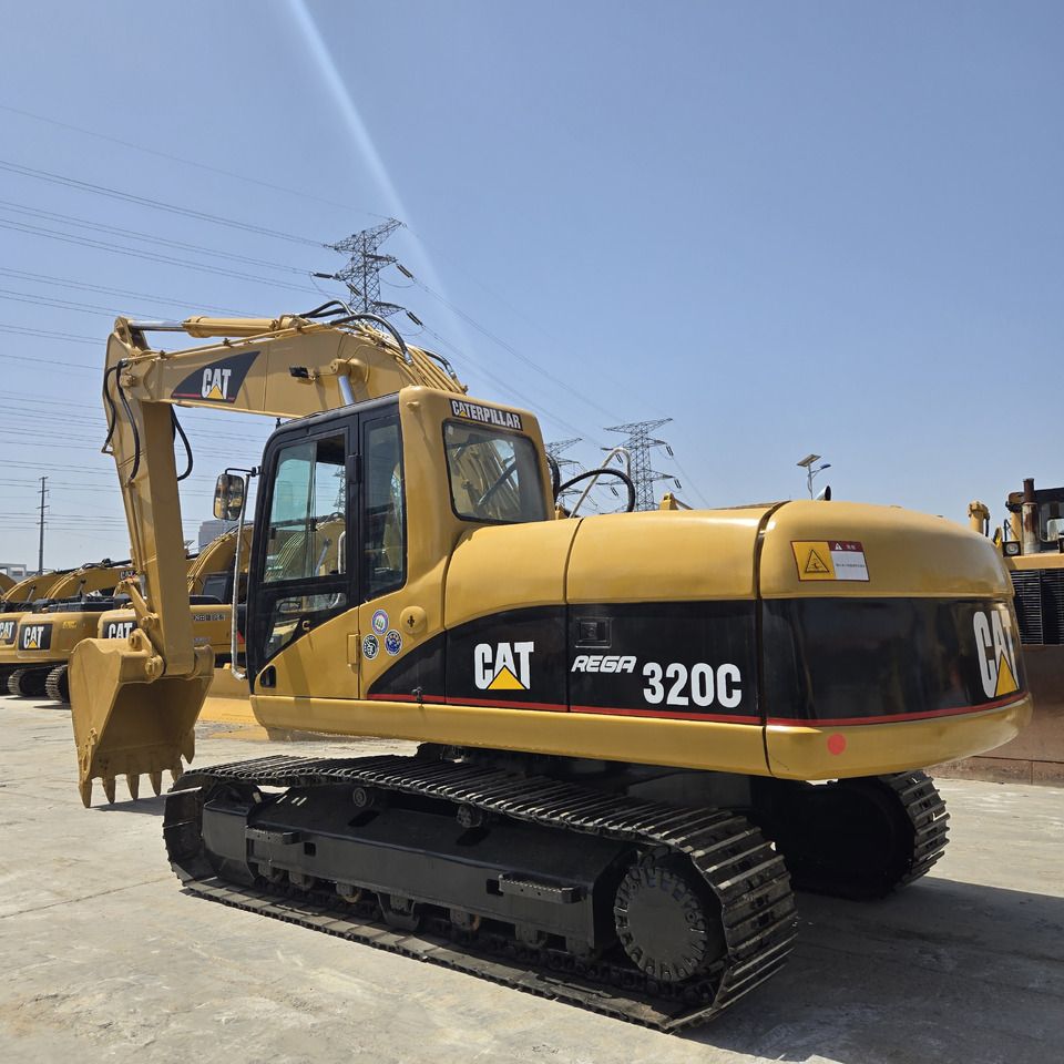 2019 Caterpillar 320C excavator, rear three-quarter view 2019 Caterpillar 320C excavator, rear three-quarter view