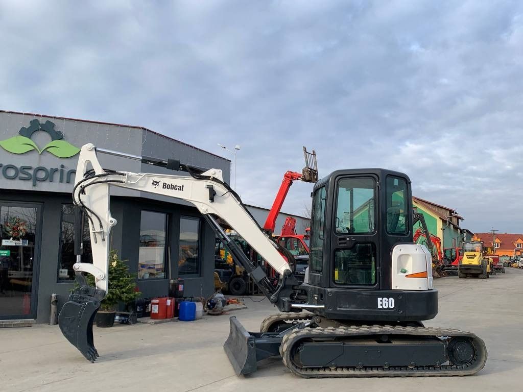 2012 Bobcat E60 mini excavator, side view