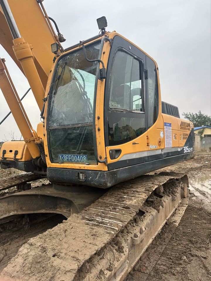 2018 Hyundai R305LC-9T crawler excavator, side view of cab 2018 Hyundai R305LC-9T crawler excavator, side view of cab