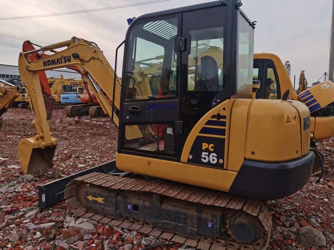 Komatsu PC56 mini excavator, side view
