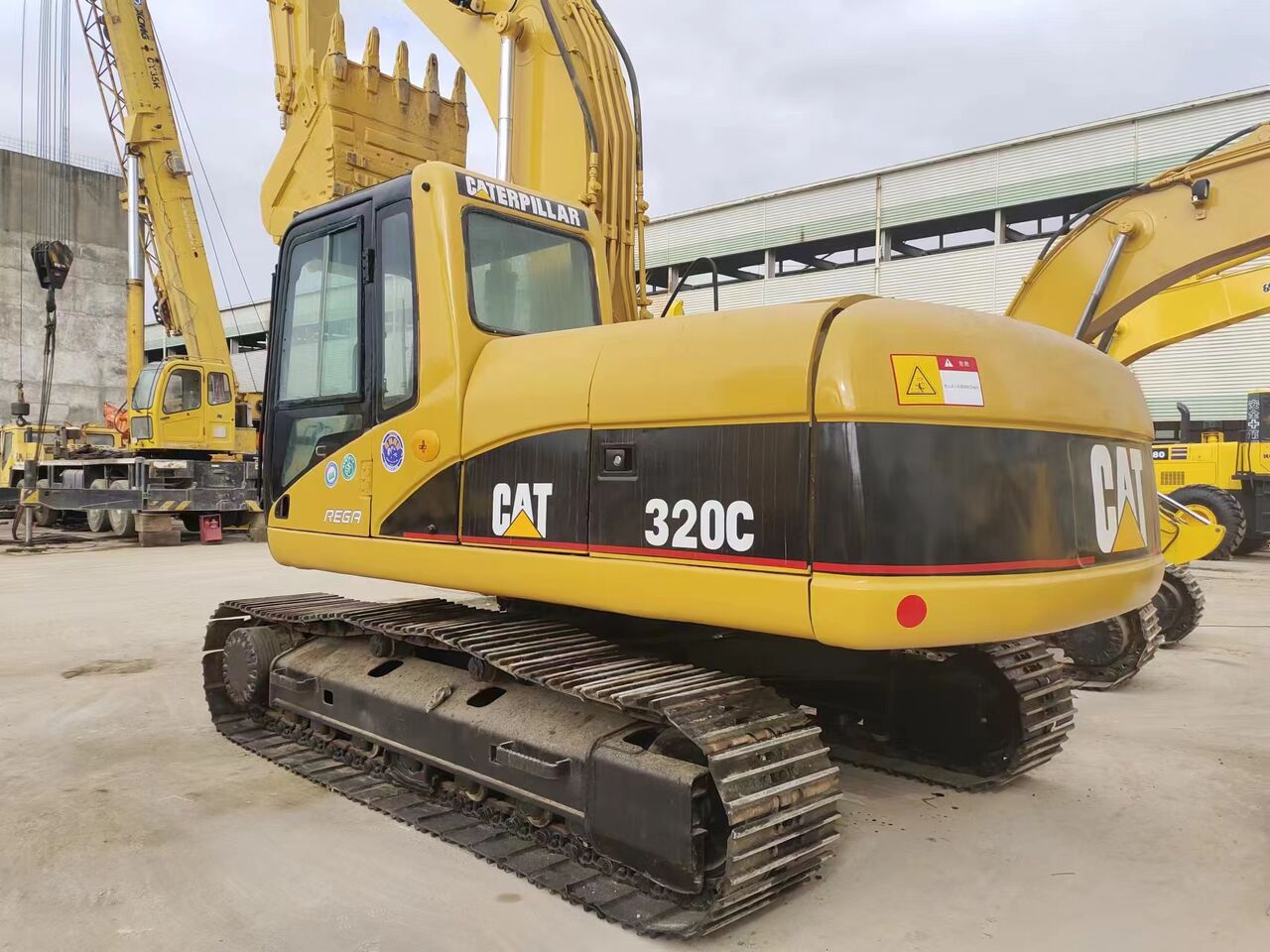2018 Caterpillar 320C crawler excavator, rear three-quarter view