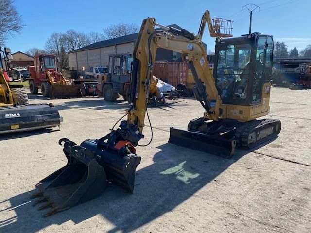 2023 Caterpillar 303CR mini excavator, front three-quarter view 2023 Caterpillar 303CR mini excavator, front three-quarter view