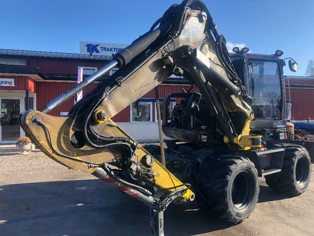 2016 Wacker Neuson EW100 wheel excavator side view 2016 Wacker Neuson EW100 wheel excavator side view