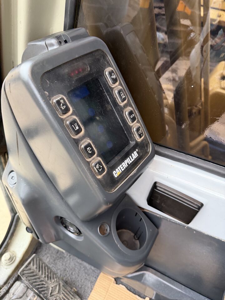 2024 Caterpillar 320BL crawler excavator interior control panel
