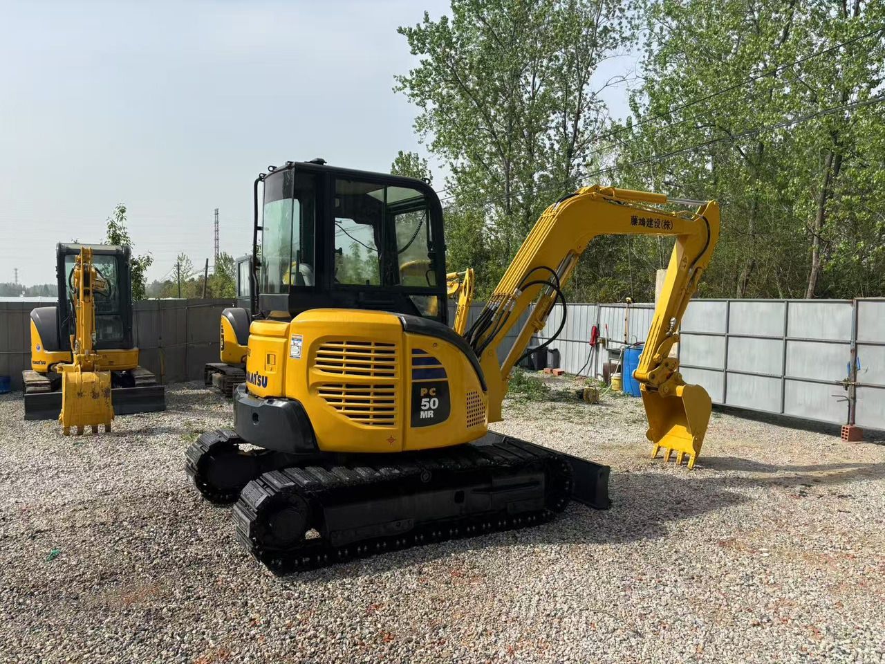 2023 Komatsu PC50MR-3 mini excavator, rear three-quarter view 2023 Komatsu PC50MR-3 mini excavator, rear three-quarter view