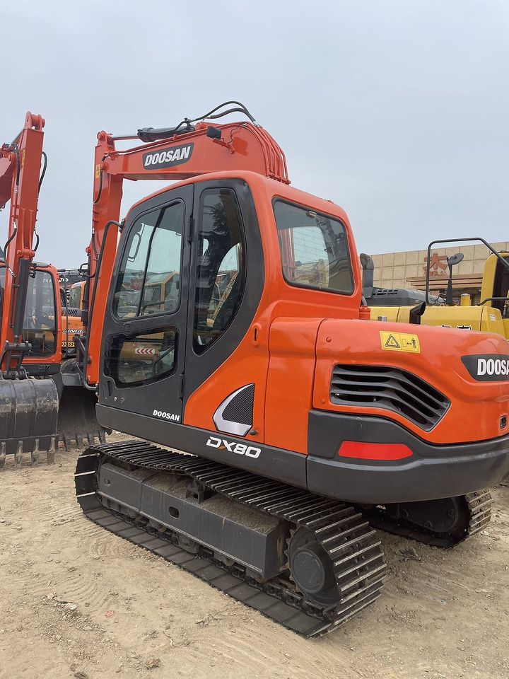 2021 Doosan DX80 crawler excavator, rear three-quarter view 2021 Doosan DX80 crawler excavator, rear three-quarter view