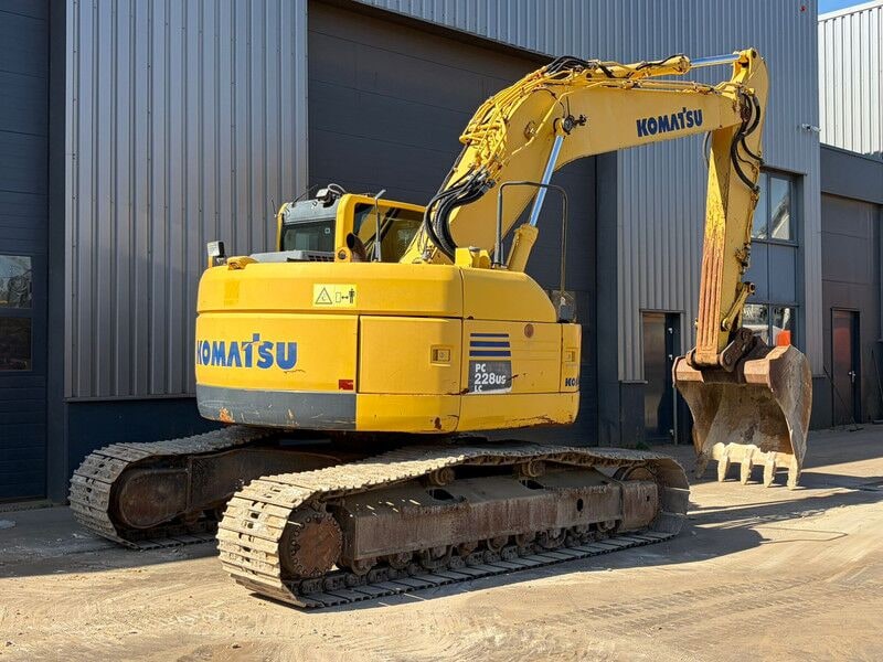 2012 Komatsu PC228USLC-8 crawler excavator, rear three-quarter view 2012 Komatsu PC228USLC-8 crawler excavator, rear three-quarter view