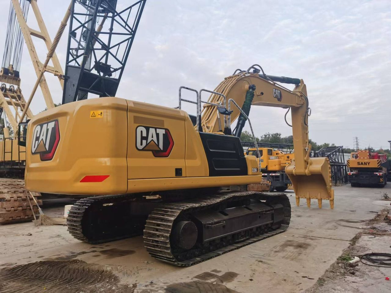 2022 Caterpillar 336GC crawler excavator, rear three-quarter view 2022 Caterpillar 336GC crawler excavator, rear three-quarter view