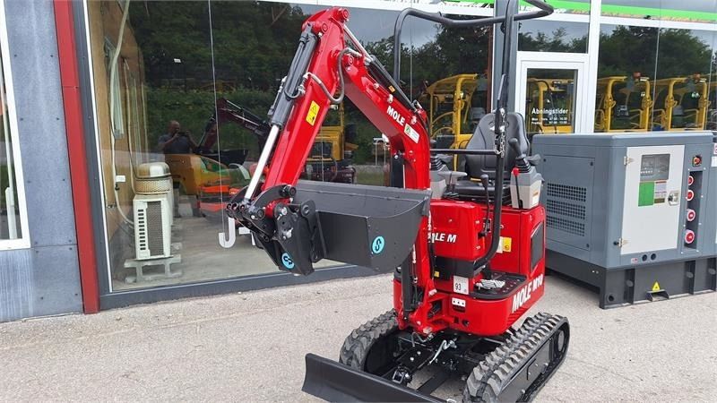 Mole M10 mini excavator, front three-quarter view Mole M10 mini excavator, front three-quarter view
