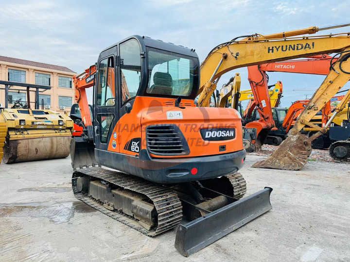 2022 Doosan DX60 crawler excavator, rear three-quarter view