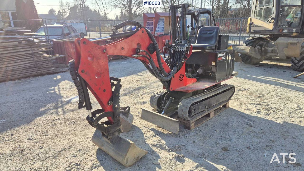 2020 Springer MAX PRO-E mini excavator, side view 2020 Springer MAX PRO-E mini excavator, side view