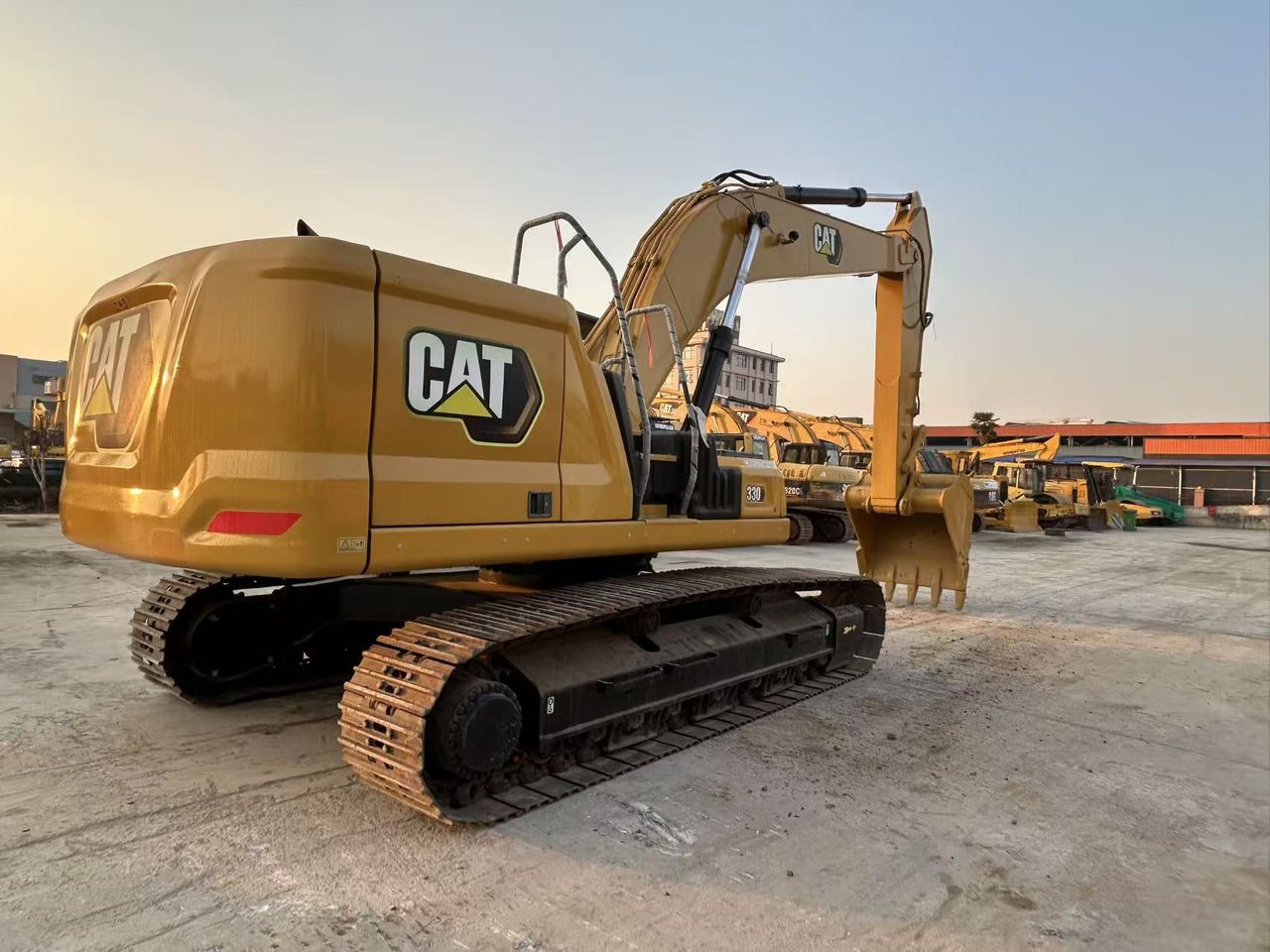 2019 Caterpillar 330 crawler excavator, rear three-quarter view 2019 Caterpillar 330 crawler excavator, rear three-quarter view