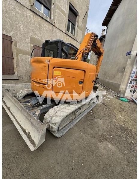 2015 Kobelco SK75 mini excavator, rear three-quarter view 2015 Kobelco SK75 mini excavator, rear three-quarter view
