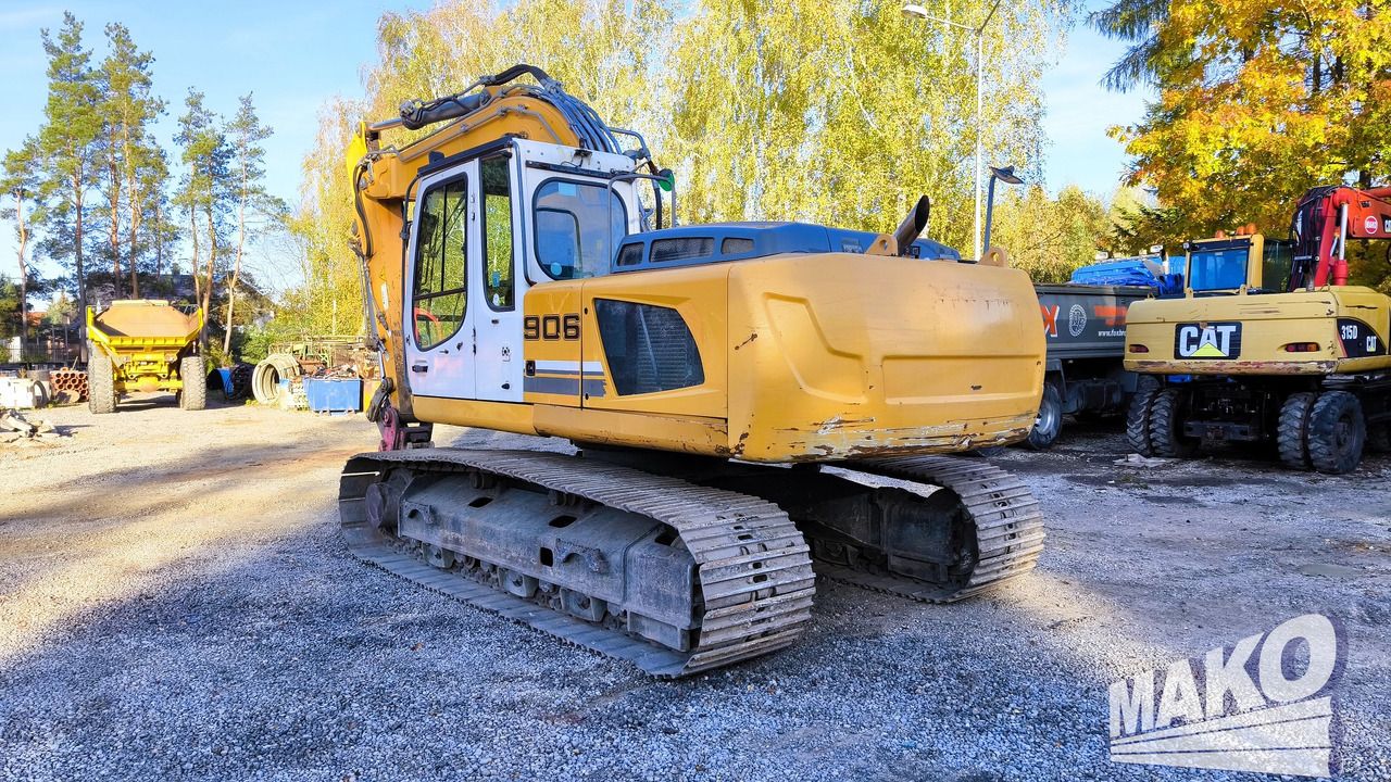 2014 Liebherr R906LC crawler excavator, rear three-quarter view 2014 Liebherr R906LC crawler excavator, rear three-quarter view