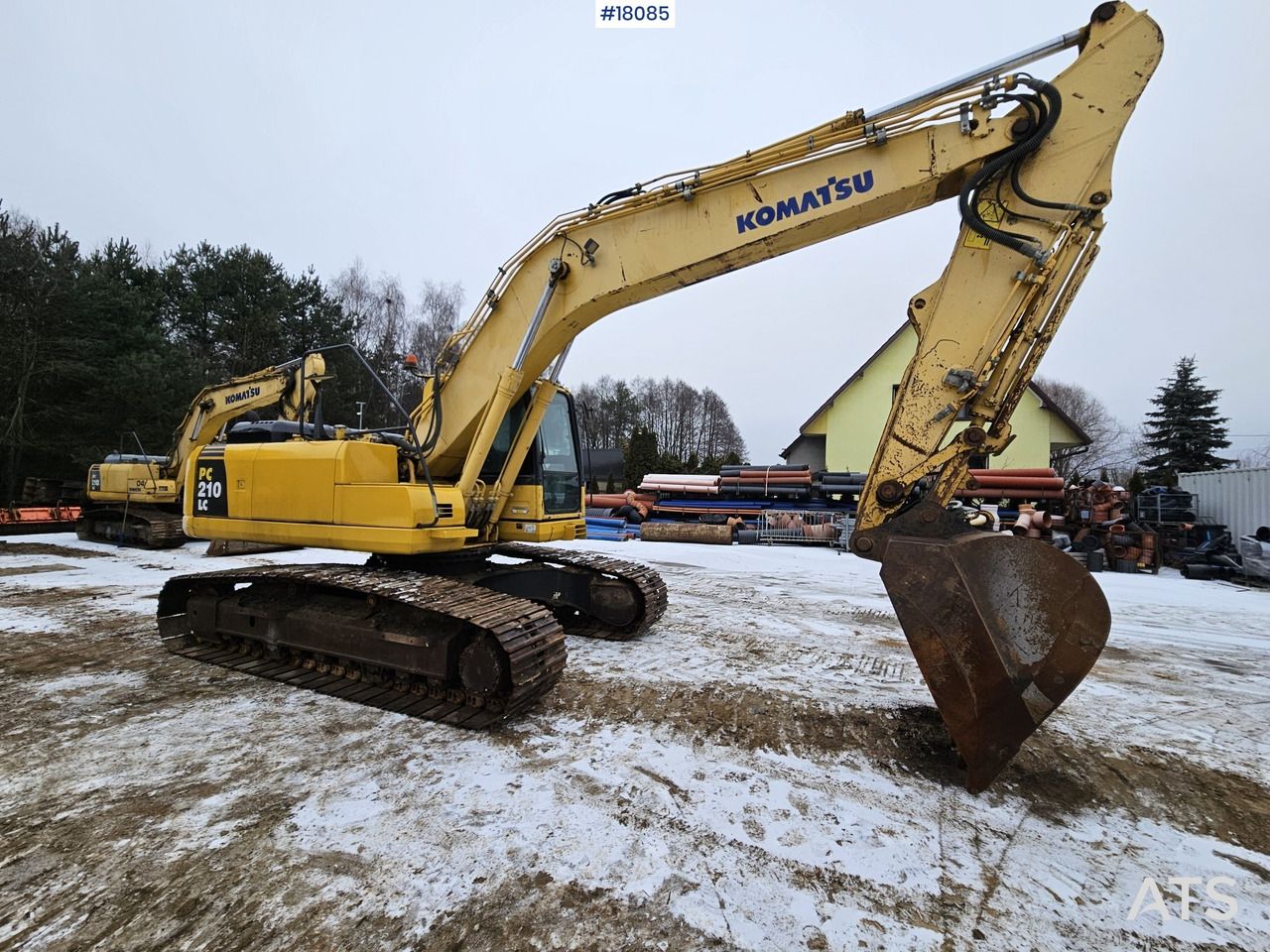 2011 Komatsu PC210LC-8 crawler excavator, side view 2011 Komatsu PC210LC-8 crawler excavator, side view