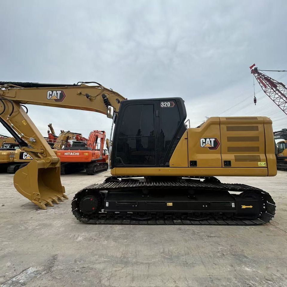 2023 Caterpillar 320 excavator, side profile view