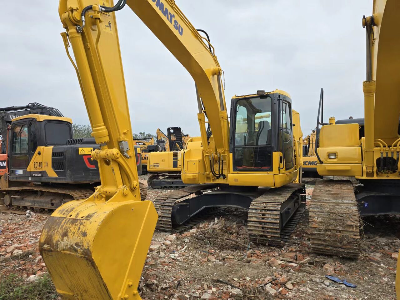 2023 Komatsu PC138US crawler excavator, front three-quarter view 2023 Komatsu PC138US crawler excavator, front three-quarter view