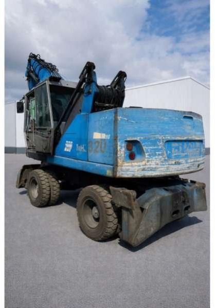 2010 Fuchs MHL320 material handler, rear three-quarter view 2010 Fuchs MHL320 material handler, rear three-quarter view