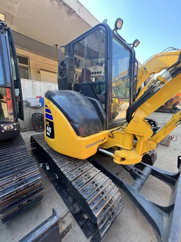 2022 Komatsu PC40MR mini excavator, rear three-quarter view 2022 Komatsu PC40MR mini excavator, rear three-quarter view