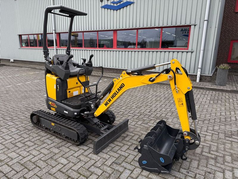 2025 New Holland E12D mini excavator, front three-quarter view