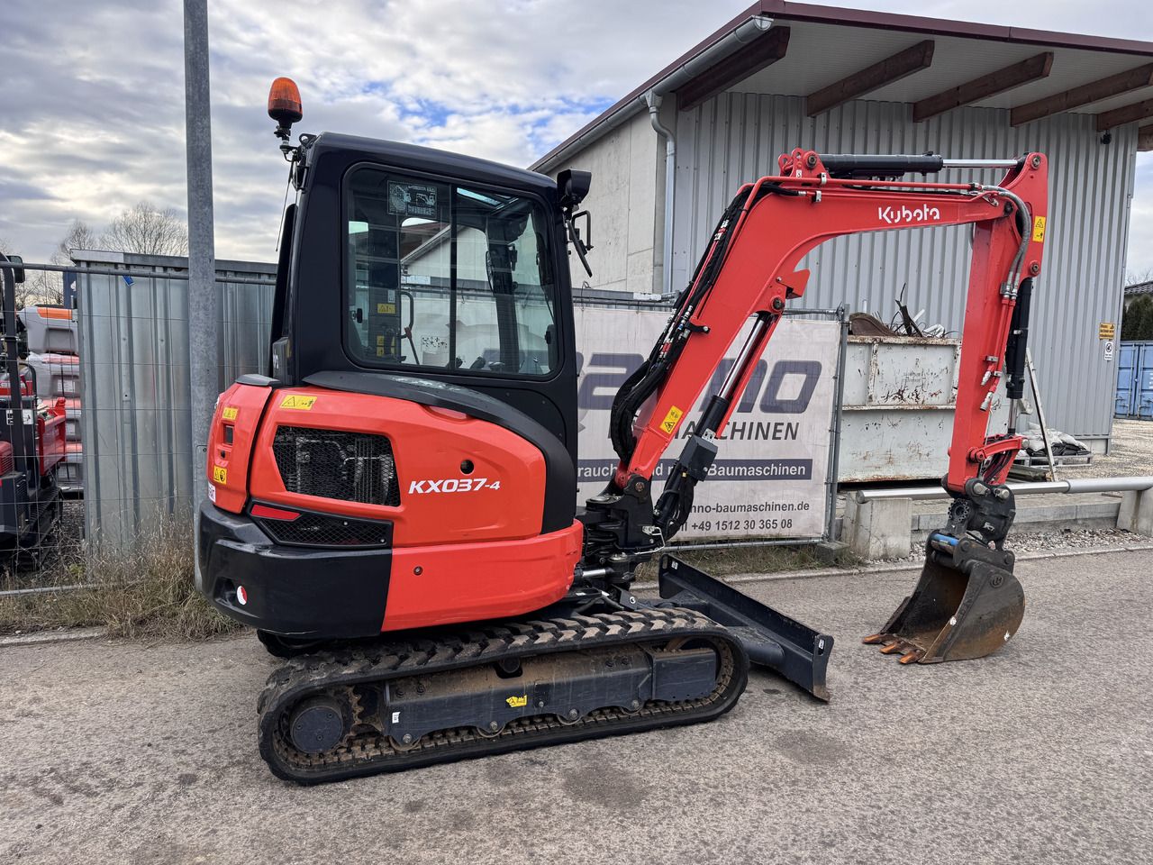 2023 Kubota KX037-4 mini excavator, side view
