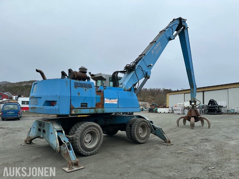 2006 Terex Fuchs MHL 350 wheel excavator, rear three-quarter view