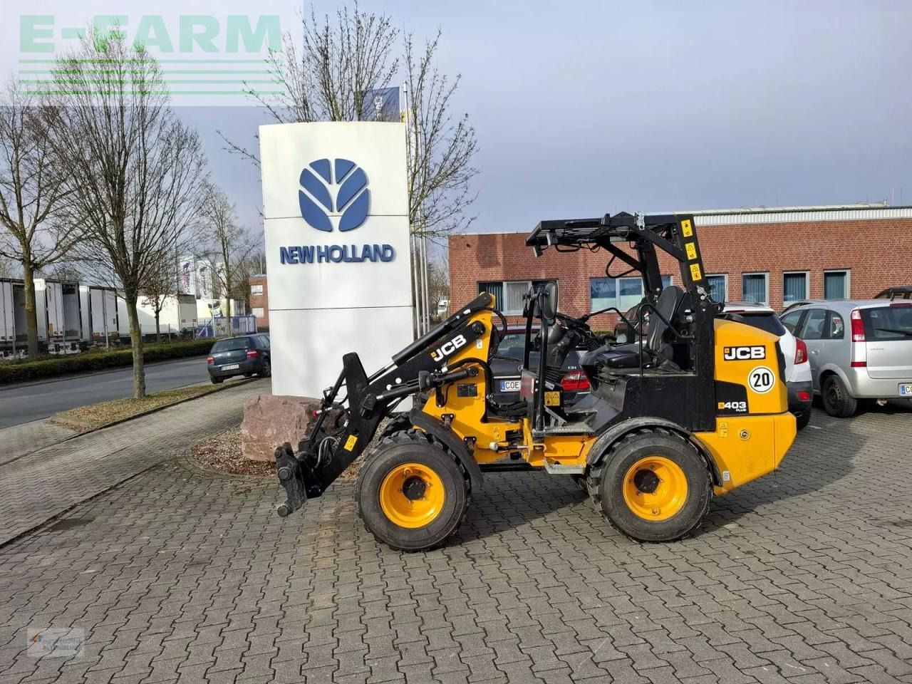 2024 JCB 403PLUS wheel loader, side view 2024 JCB 403PLUS wheel loader, side view